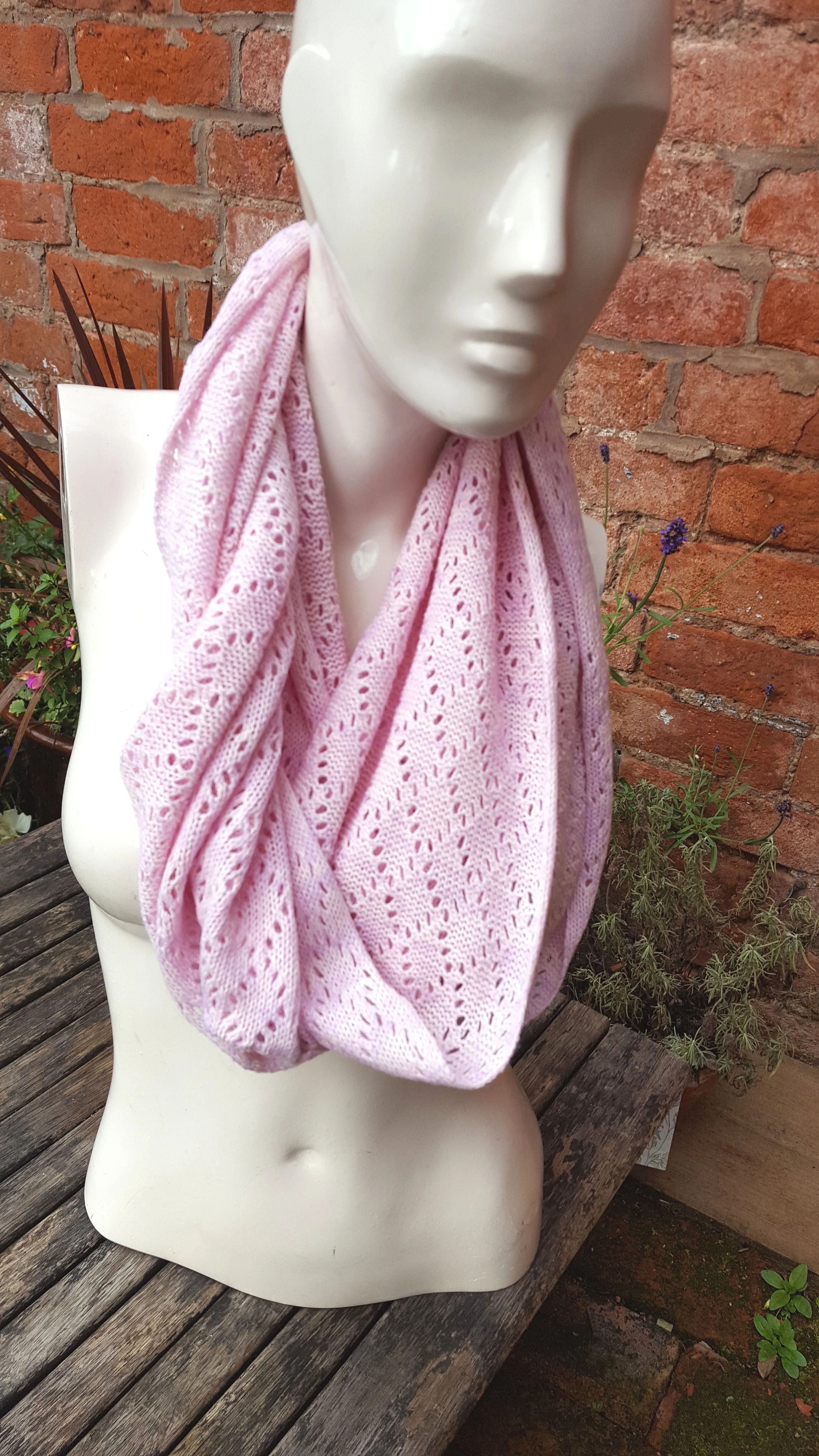 Handmade cowl, infinity scarf, mobius scarf, in pinks and lilac Acrylic mix yarn.