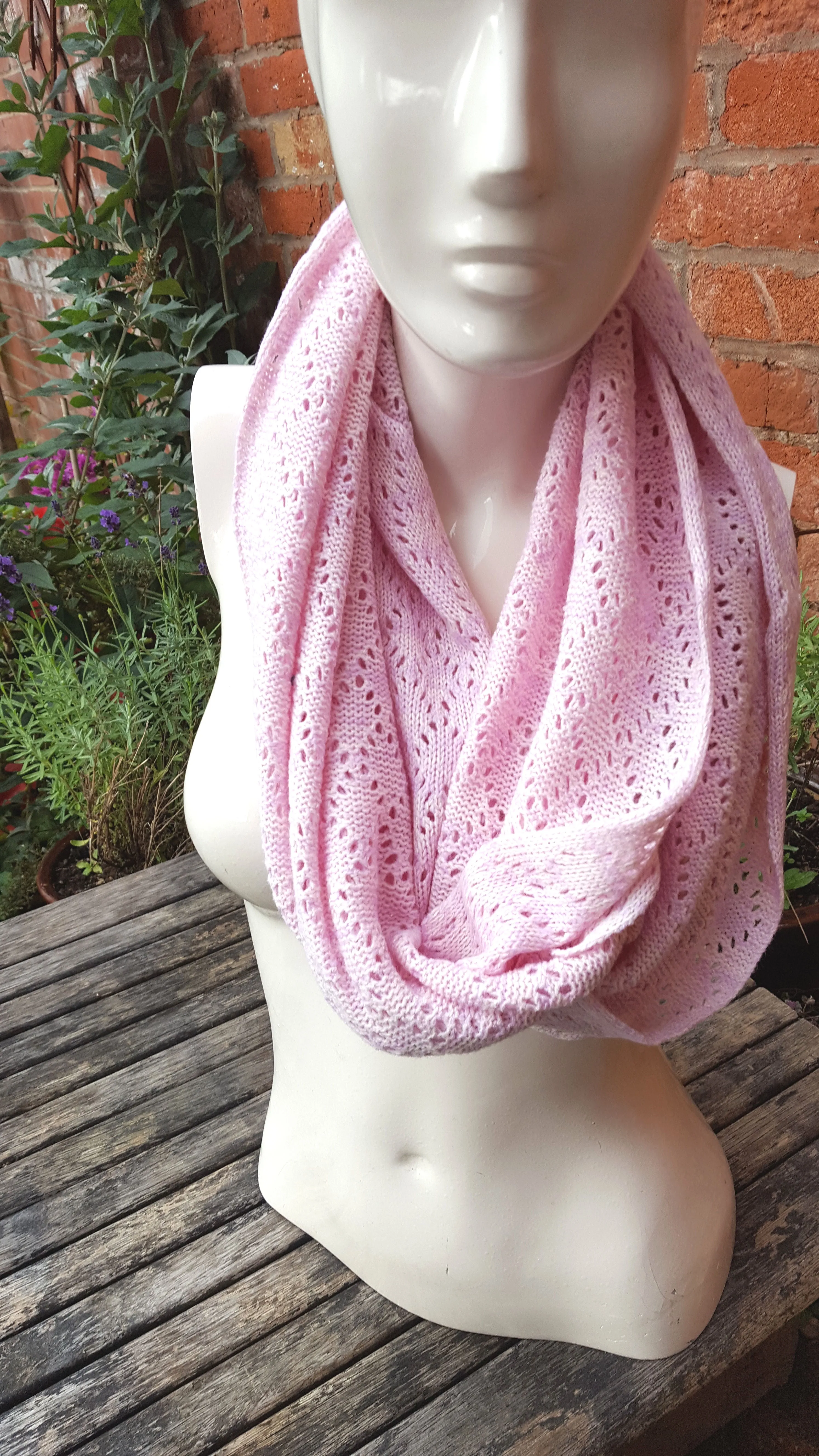 Handmade cowl, infinity scarf, mobius scarf, in pinks and lilac Acrylic mix yarn.